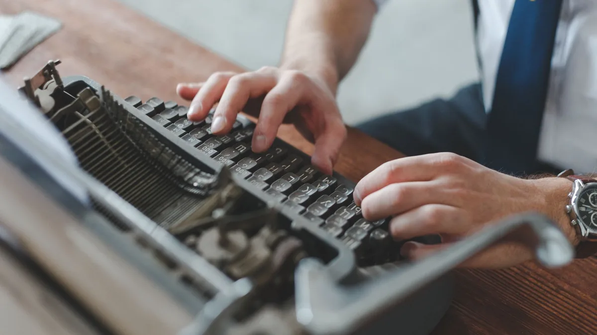 A detailed close up of hands working on a classic vintag