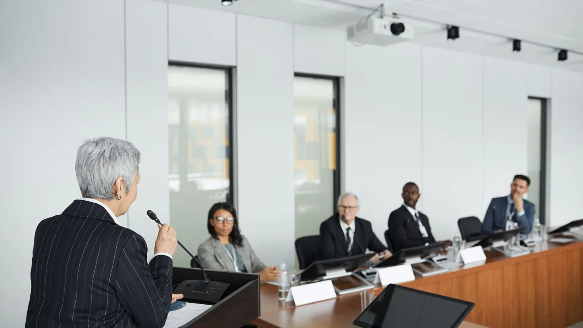 A diverse group of professionals engaging in a business