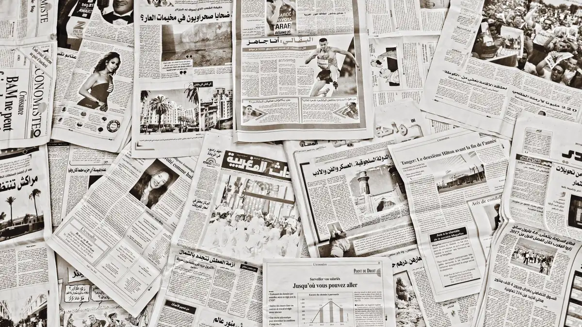 A flat lay of arabic newspapers in f s morocco showcasin