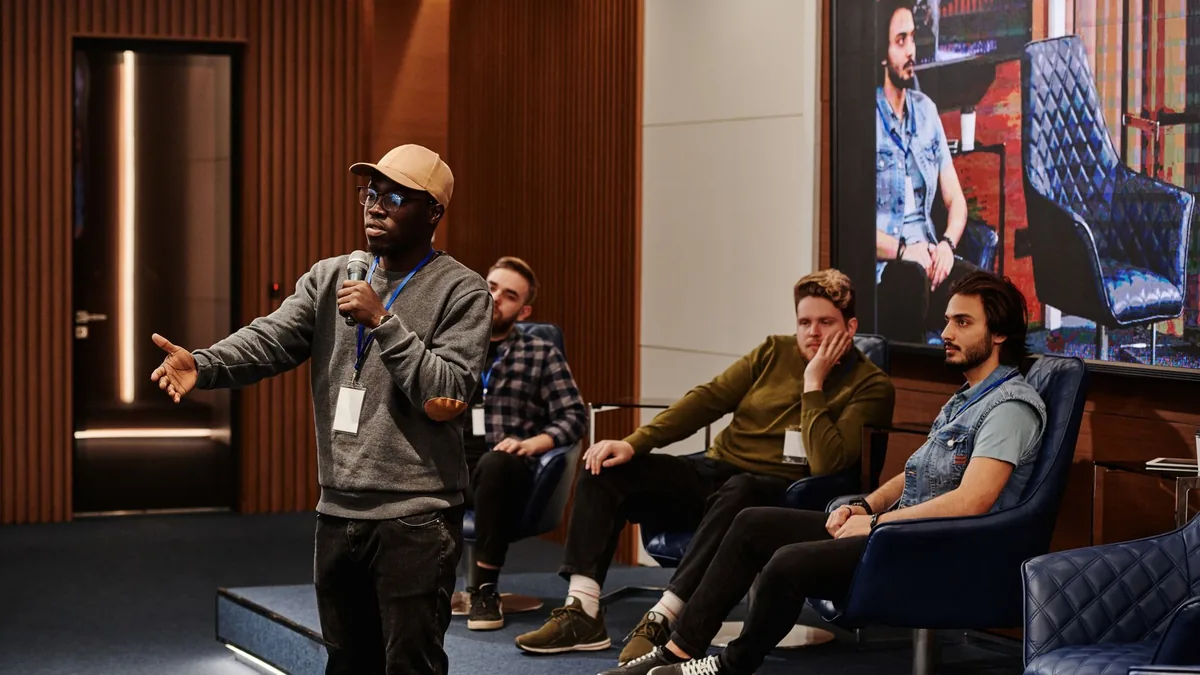 A group of diverse men engaging in a business conference