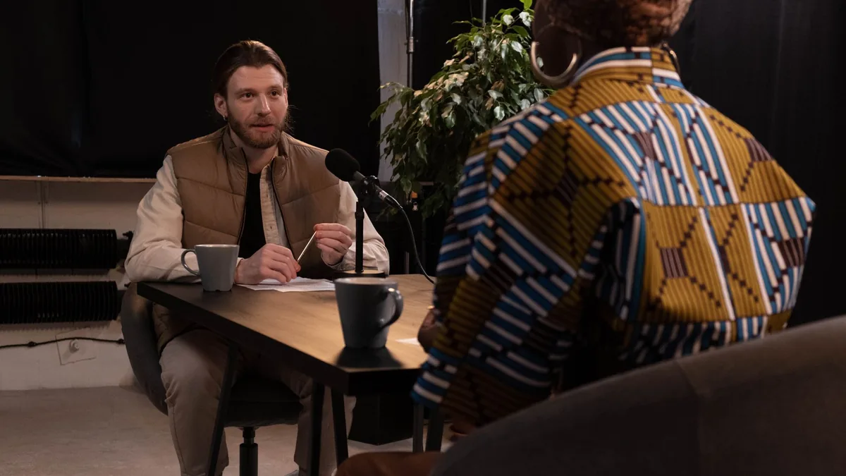A podcast interview featuring diverse hosts in a profess