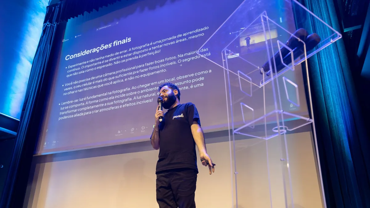 A speaker engages the audience during a conference prese