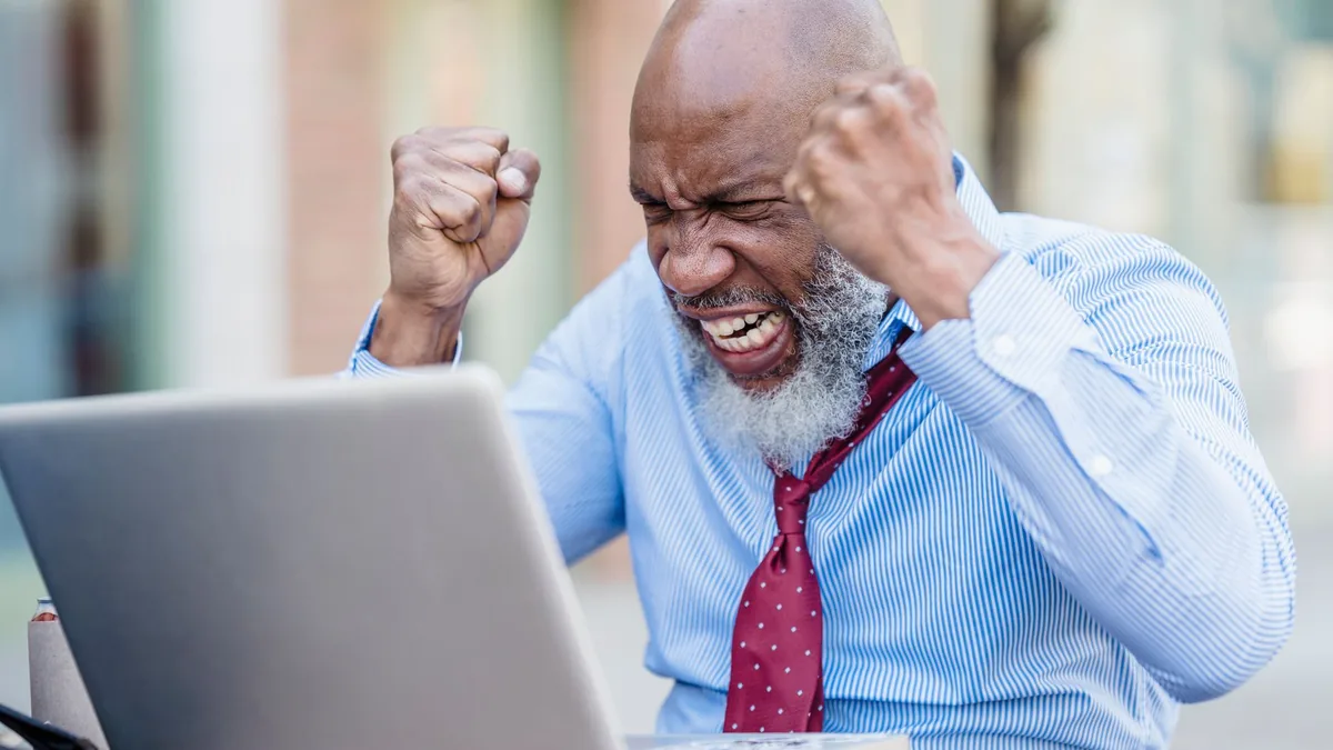 African american businessman showing frustration working