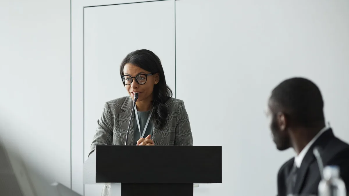 African american businesswoman delivering a speech at a