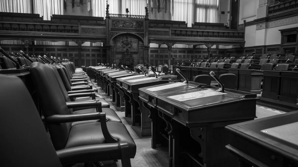 Black and white photo of a traditional legislative assem