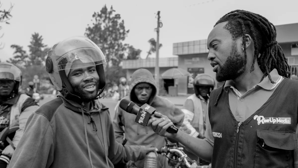 Black and white street interview with motorcycle riders