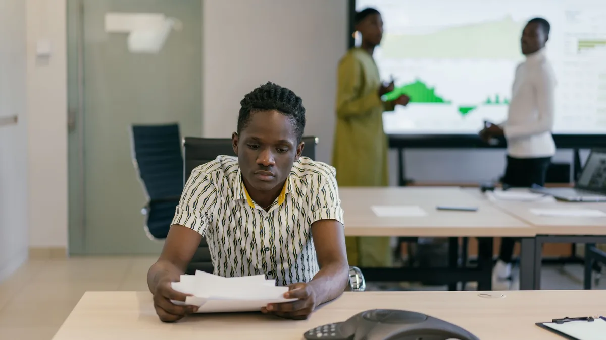 Business professionals analyzing data in a contemporary