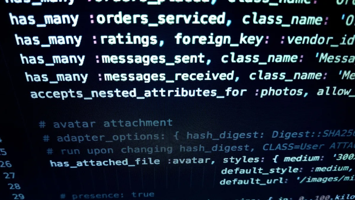 Close up image featuring detailed programming code on a