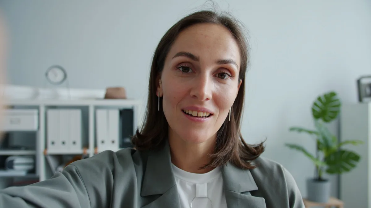 Close up of a confident woman in an office environment s
