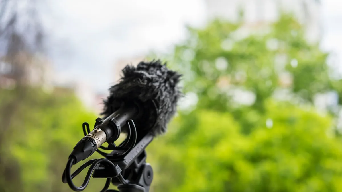 Close up of a professional microphone set up outdoors wi
