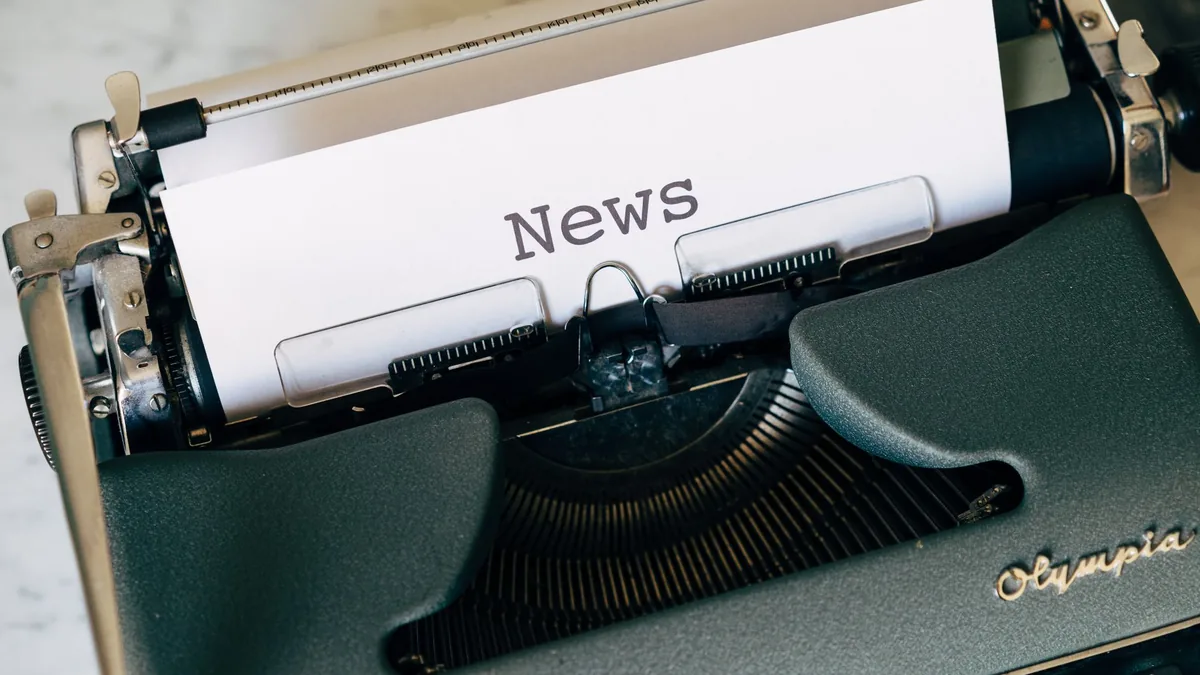 Close up of a vintage olympia typewriter with paper read