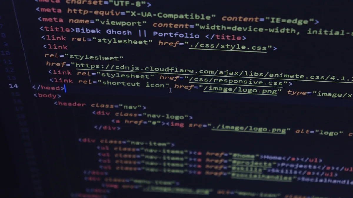 Close up of html and css code displayed on a computer sc