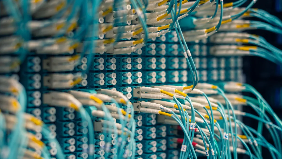 Closeup of rows of tiny round white electrical connector