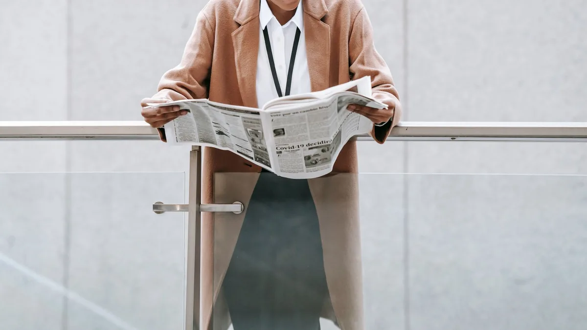 Crop content african american businesswoman in formal cl