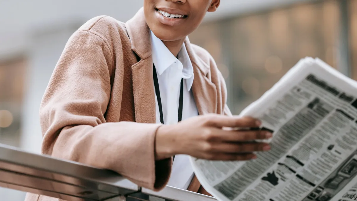 Crop happy african american businesswoman in formal clot