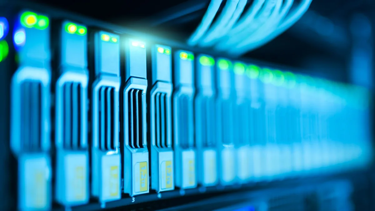 Detailed image of a server rack with glowing lights in a