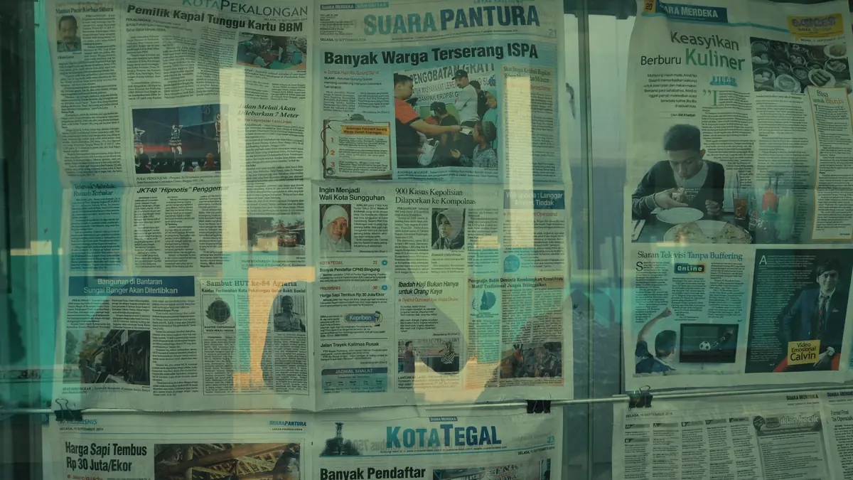 Detailed view of various newspapers on display in jakart