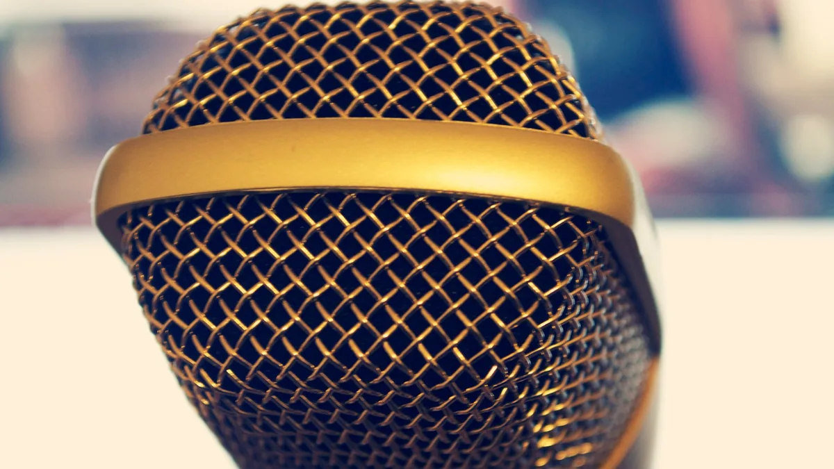 Elegant close up of a gold microphone perfect for audio