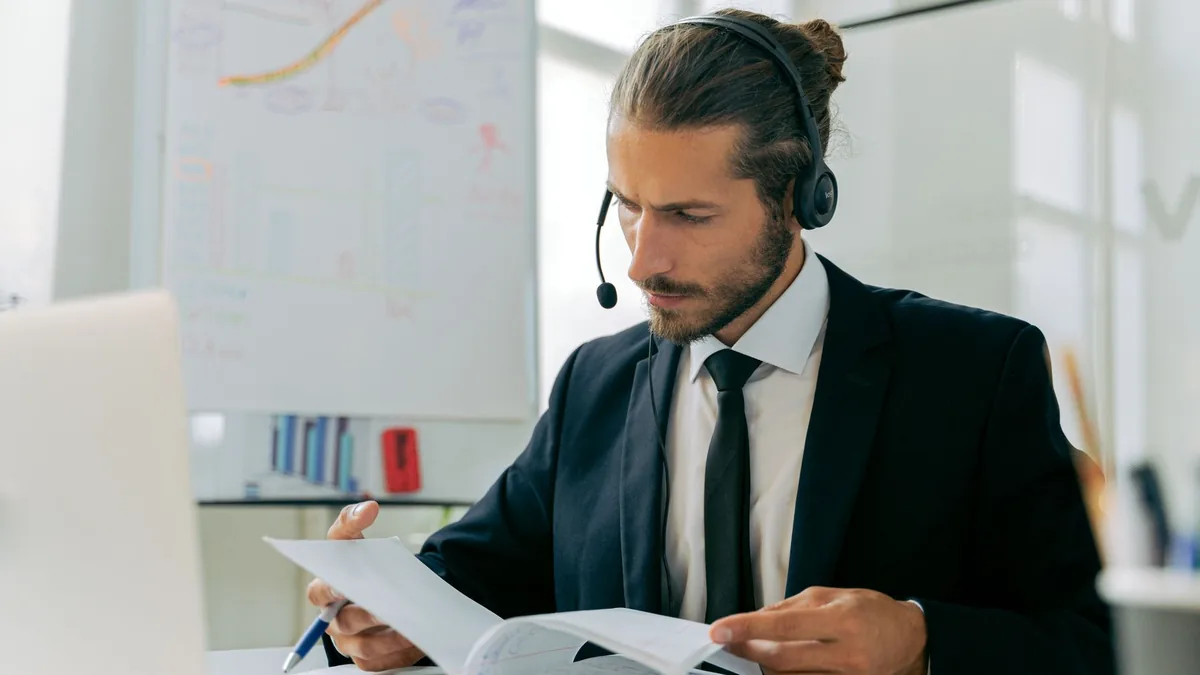 Focused business professional handling customer service