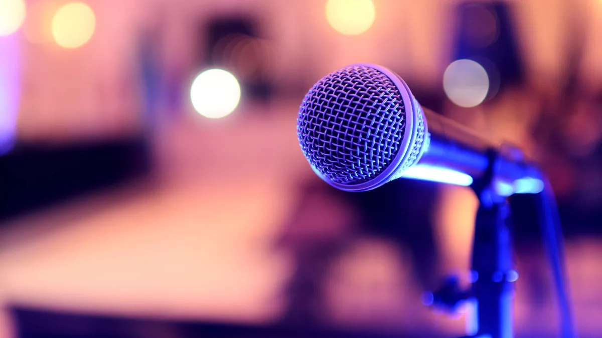 Focused image of a microphone on stage perfect for event