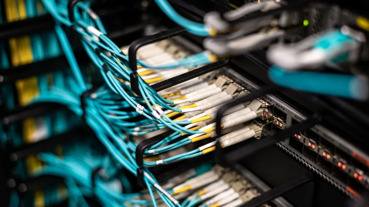 Numerous wires and cables mounted into server patch pane