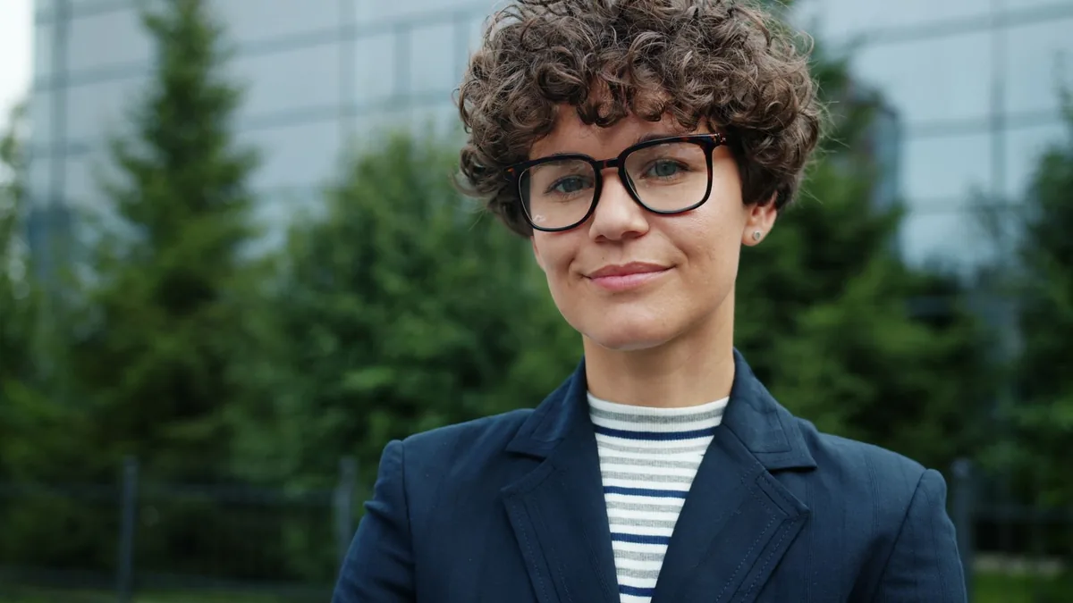 Outdoor portrait of a confident business professional wi
