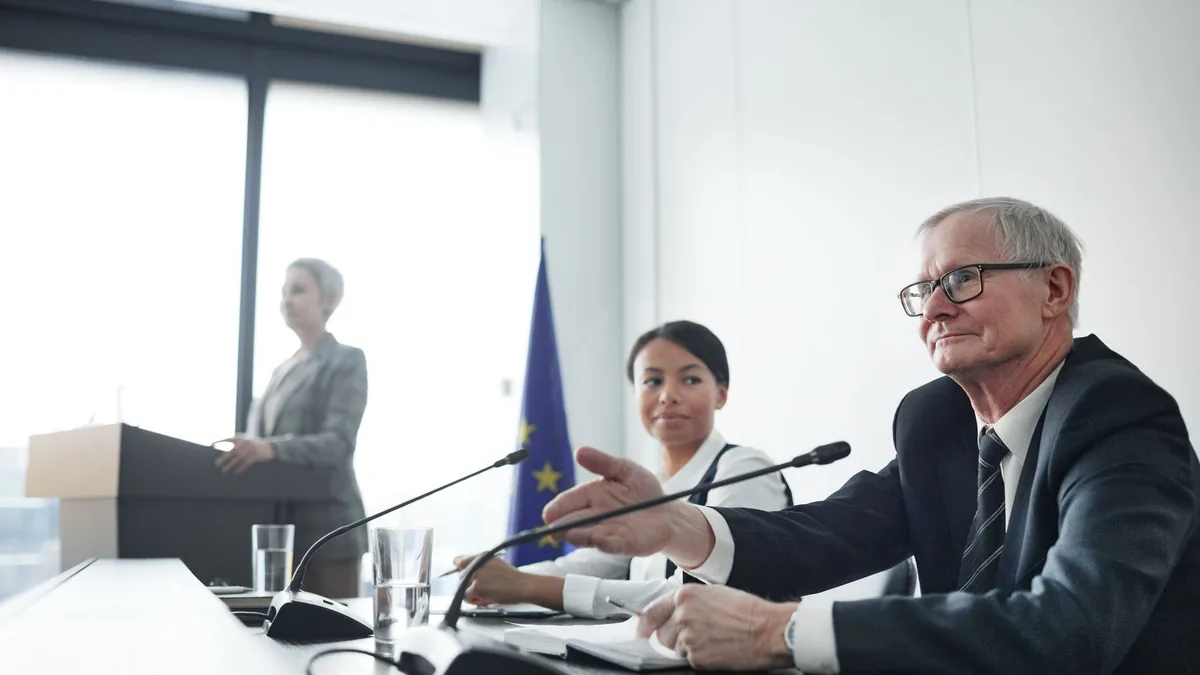 Panelists at an eu conference discussing law and diploma