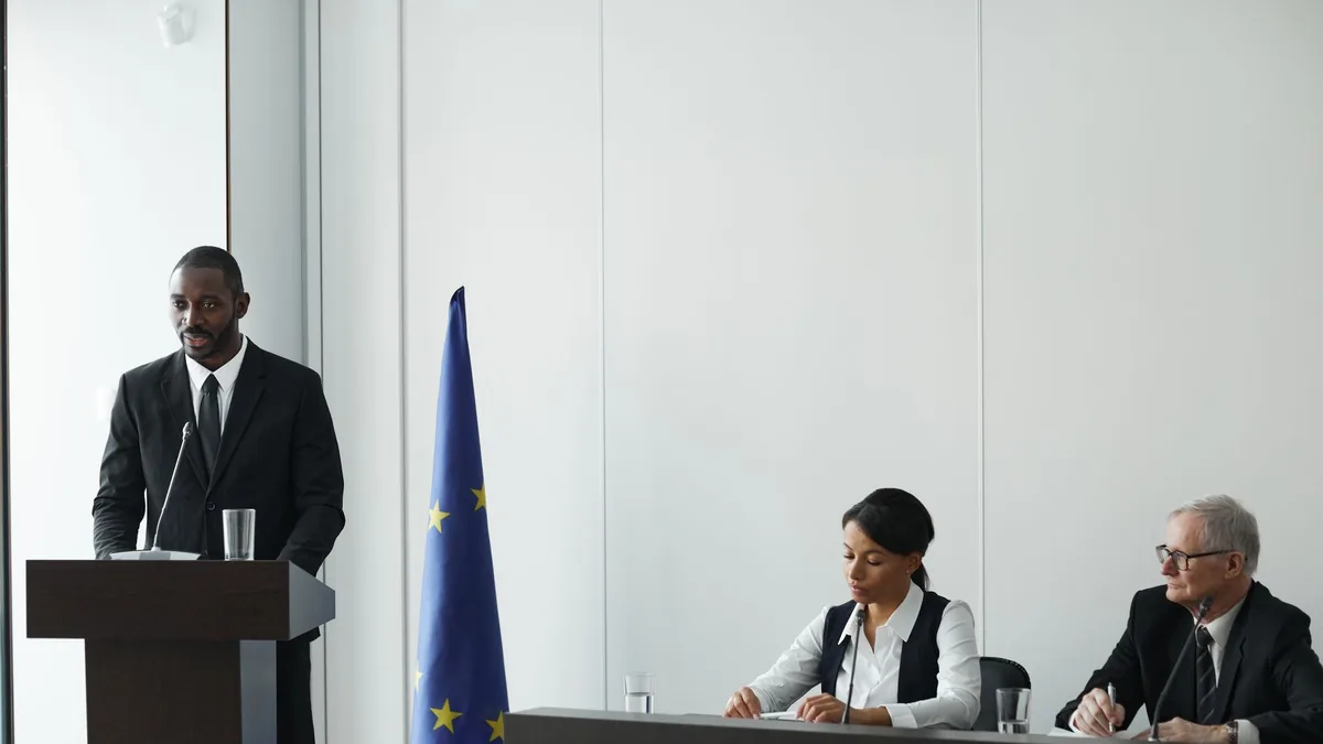 Professional business conference with eu flag diverse sp