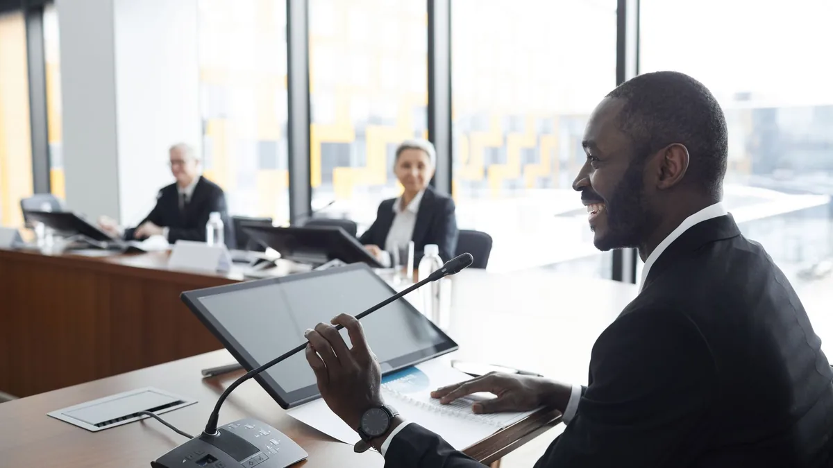 Professional business meeting with smiling participants