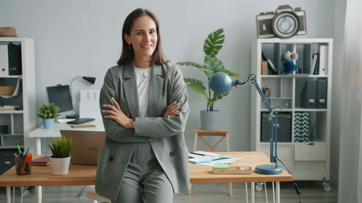 Professional businesswoman smiling confidently in a mode
