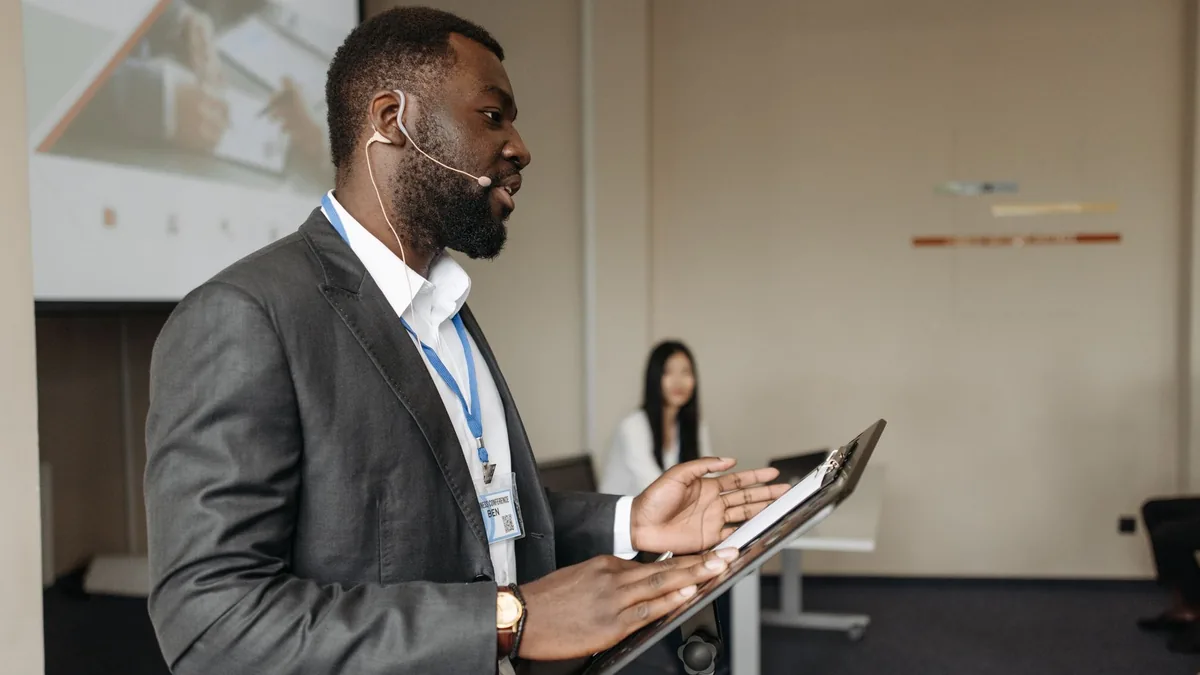 Professional speaker at a business conference presenting