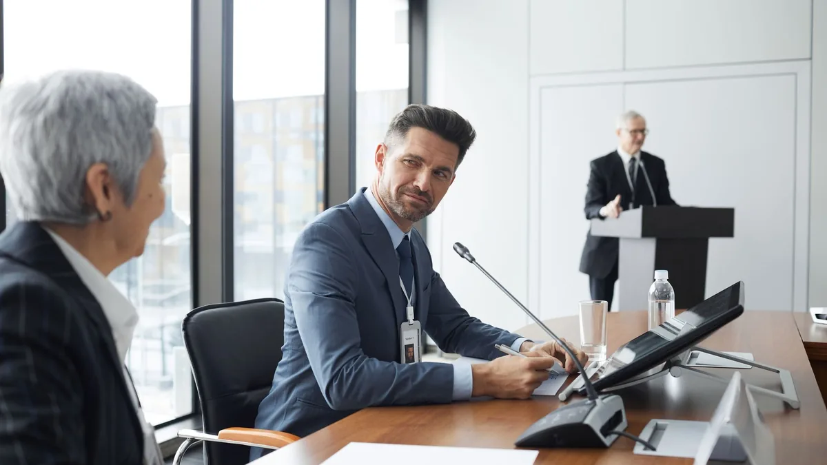 Professionals engaging in a business meeting showcasing