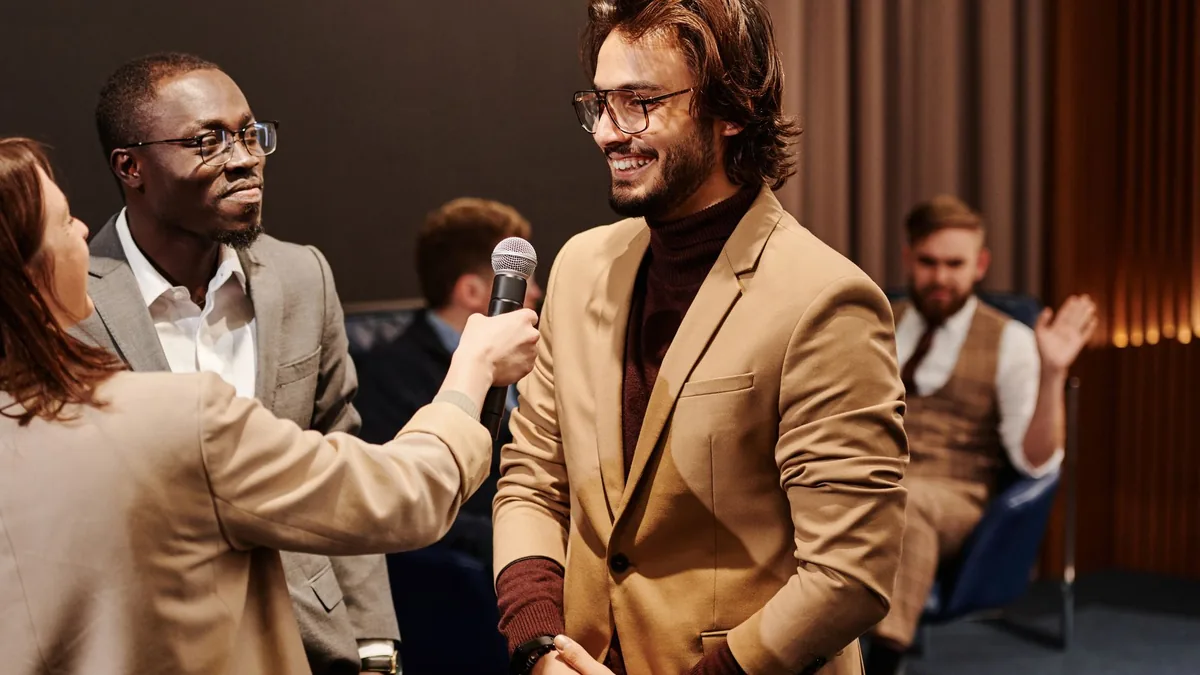 Smiling professionals engaging in a friendly interview s