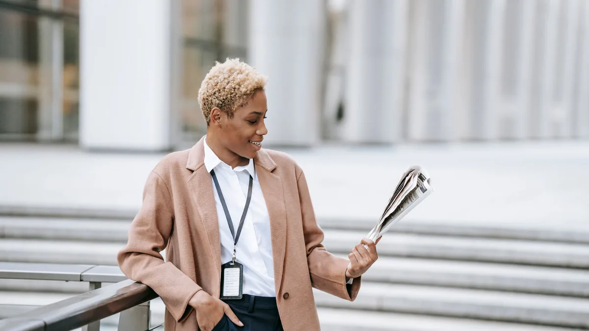 Smiling young african american female entrepreneur in st