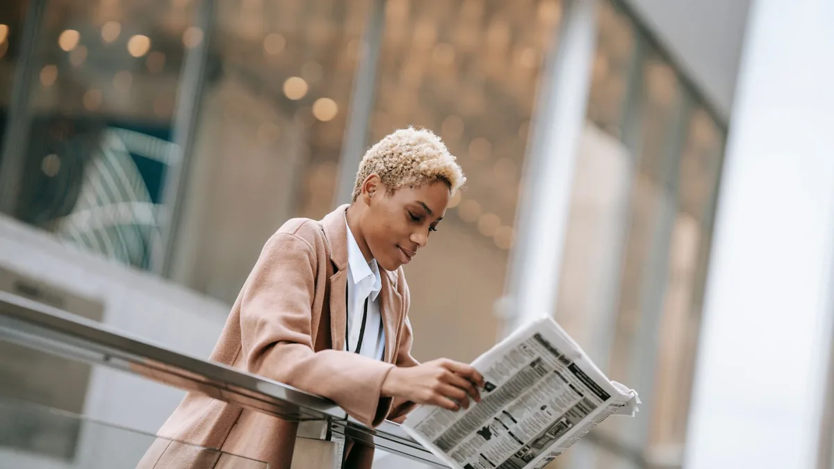 Young attractive african american businesswoman in forma